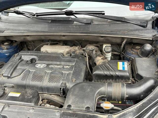 Синий Хендай Туксон, объемом двигателя 1.98 л и пробегом 163 тыс. км за 7990 $, фото 34 на Automoto.ua