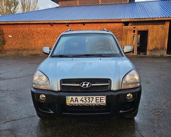 Синій Хендай Туксон, об'ємом двигуна 1.98 л та пробігом 203 тис. км за 8200 $, фото 3 на Automoto.ua