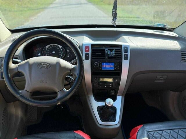 Синій Хендай Туксон, об'ємом двигуна 2 л та пробігом 262 тис. км за 4500 $, фото 6 на Automoto.ua