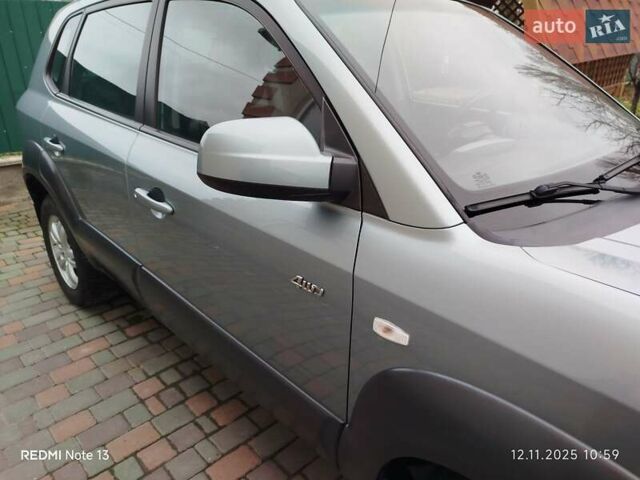 Синий Хендай Туксон, объемом двигателя 2 л и пробегом 213 тыс. км за 8900 $, фото 34 на Automoto.ua