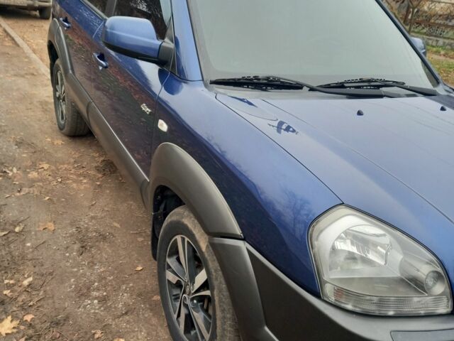 Синий Хендай Туксон, объемом двигателя 2 л и пробегом 170 тыс. км за 8500 $, фото 7 на Automoto.ua