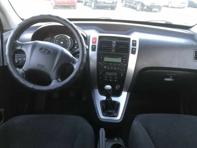 Синий Хендай Туксон, объемом двигателя 2 л и пробегом 207 тыс. км за 6890 $, фото 8 на Automoto.ua