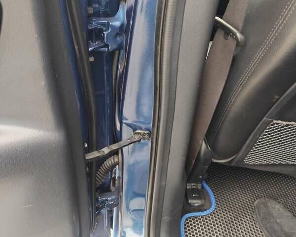 Синий Хендай Туксон, объемом двигателя 1.98 л и пробегом 201 тыс. км за 9400 $, фото 14 на Automoto.ua