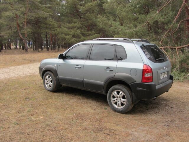 Синий Хендай Туксон, объемом двигателя 2 л и пробегом 180 тыс. км за 8000 $, фото 8 на Automoto.ua