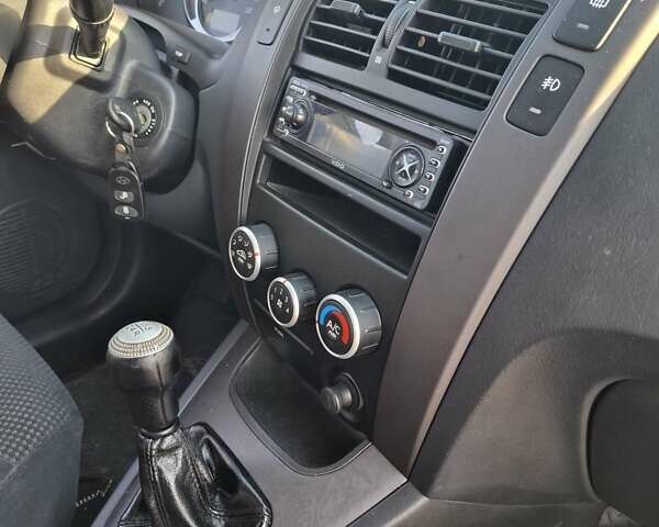 Синій Хендай Туксон, об'ємом двигуна 2 л та пробігом 158 тис. км за 8500 $, фото 14 на Automoto.ua