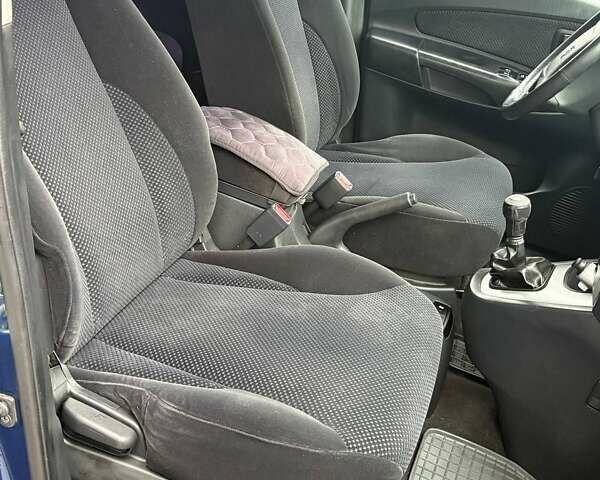 Синий Хендай Туксон, объемом двигателя 1.98 л и пробегом 163 тыс. км за 7990 $, фото 21 на Automoto.ua