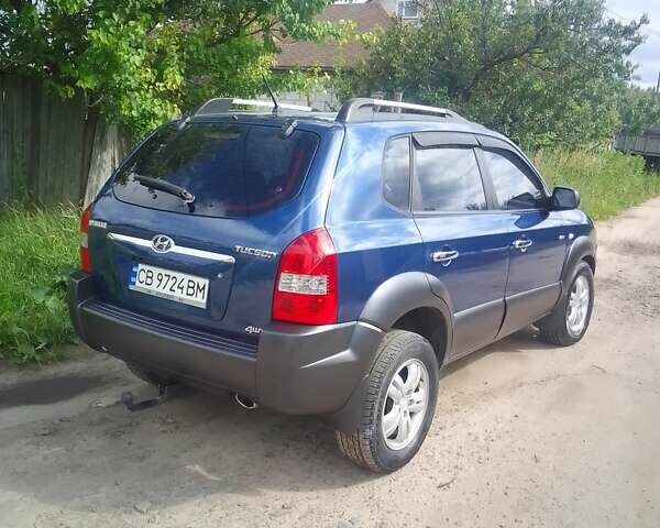 Синій Хендай Туксон, об'ємом двигуна 1.98 л та пробігом 190 тис. км за 7900 $, фото 2 на Automoto.ua