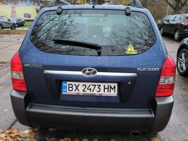 Синий Хендай Туксон, объемом двигателя 2 л и пробегом 156 тыс. км за 6850 $, фото 4 на Automoto.ua