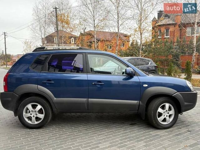 Синий Хендай Туксон, объемом двигателя 1.98 л и пробегом 163 тыс. км за 7990 $, фото 16 на Automoto.ua