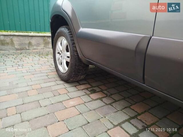 Синий Хендай Туксон, объемом двигателя 2 л и пробегом 213 тыс. км за 8900 $, фото 31 на Automoto.ua