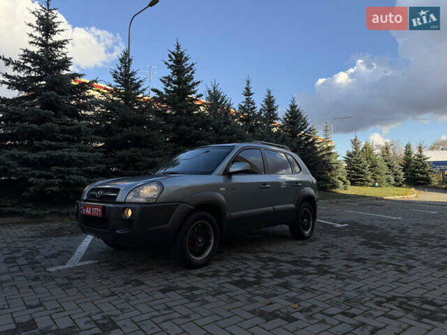 Синий Хендай Туксон, объемом двигателя 2 л и пробегом 205 тыс. км за 7500 $, фото 14 на Automoto.ua