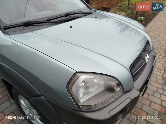 Синий Хендай Туксон, объемом двигателя 2 л и пробегом 213 тыс. км за 8900 $, фото 36 на Automoto.ua