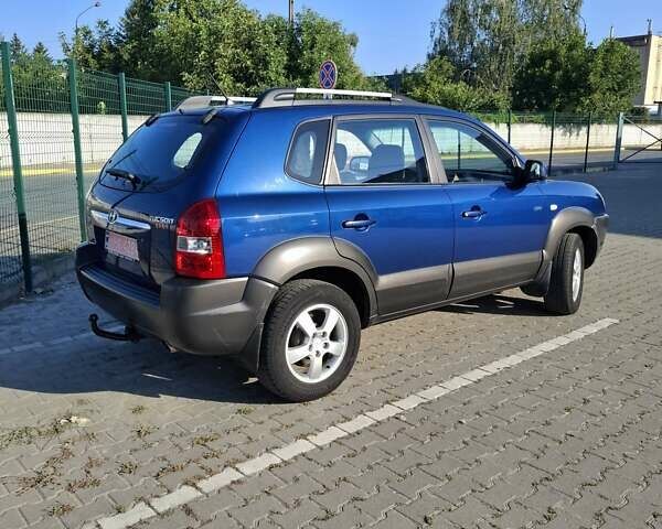 Синій Хендай Туксон, об'ємом двигуна 2 л та пробігом 158 тис. км за 8500 $, фото 2 на Automoto.ua
