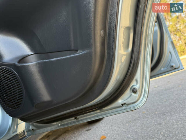 Синій Хендай Туксон, об'ємом двигуна 2 л та пробігом 203 тис. км за 7800 $, фото 18 на Automoto.ua