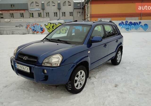 Синий Хендай Туксон, объемом двигателя 1.98 л и пробегом 228 тыс. км за 7700 $, фото 1 на Automoto.ua