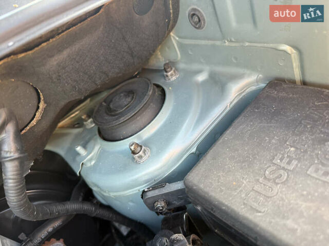 Синій Хендай Туксон, об'ємом двигуна 2 л та пробігом 203 тис. км за 7800 $, фото 24 на Automoto.ua