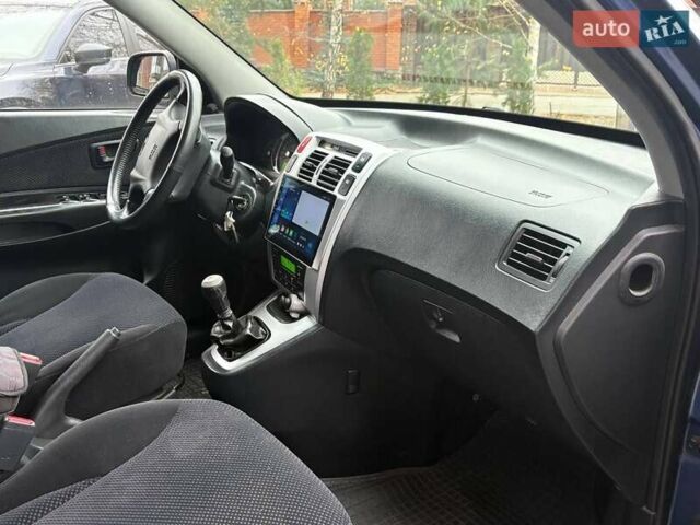 Синий Хендай Туксон, объемом двигателя 1.98 л и пробегом 163 тыс. км за 7990 $, фото 22 на Automoto.ua