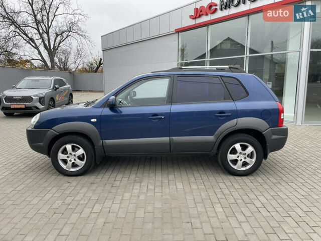Синий Хендай Туксон, объемом двигателя 1.98 л и пробегом 163 тыс. км за 8000 $, фото 7 на Automoto.ua