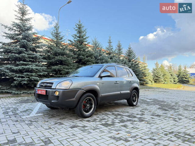 Синий Хендай Туксон, объемом двигателя 2 л и пробегом 205 тыс. км за 7500 $, фото 17 на Automoto.ua