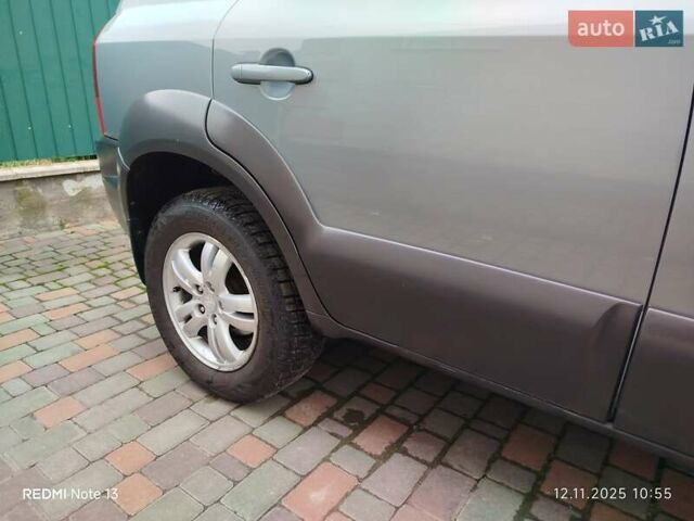 Синий Хендай Туксон, объемом двигателя 2 л и пробегом 213 тыс. км за 8900 $, фото 28 на Automoto.ua