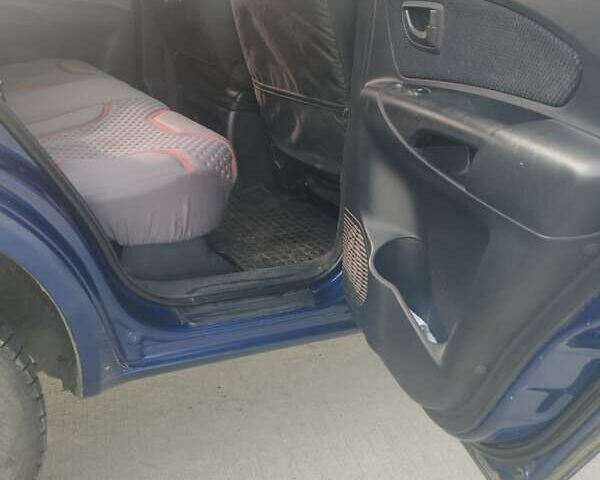 Хендай Туксон 2007 у Коростене на Automoto.ua Синій Хендай Туксон, об'ємом двигуна 1.98 л та пробігом 207 тис. км за 7000 $, фото 11 на Automoto.ua