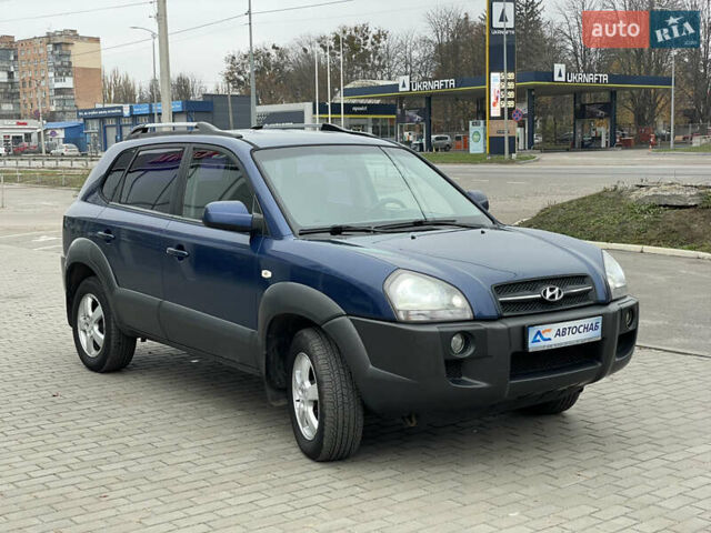 Синий Хендай Туксон, объемом двигателя 1.98 л и пробегом 163 тыс. км за 8000 $, фото 2 на Automoto.ua