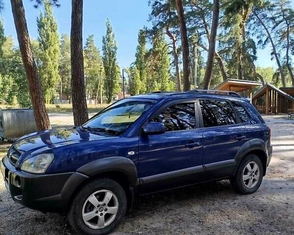 Синий Хендай Туксон, объемом двигателя 1.98 л и пробегом 267 тыс. км за 7300 $, фото 10 на Automoto.ua