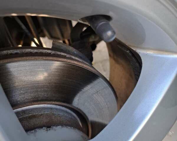 Синій Хендай Туксон, об'ємом двигуна 2 л та пробігом 158 тис. км за 8500 $, фото 24 на Automoto.ua