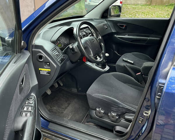 Синій Хендай Туксон, об'ємом двигуна 1.98 л та пробігом 230 тис. км за 6555 $, фото 8 на Automoto.ua
