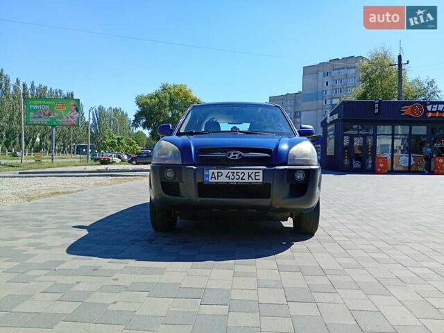 Синий Хендай Туксон, объемом двигателя 1.98 л и пробегом 203 тыс. км за 7000 $, фото 8 на Automoto.ua