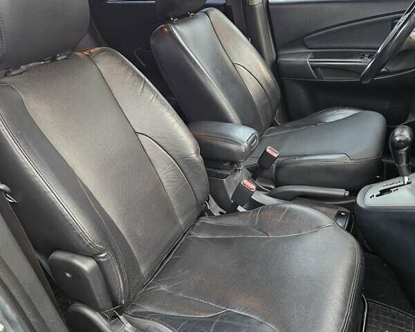 Синій Хендай Туксон, об'ємом двигуна 1.98 л та пробігом 203 тис. км за 8200 $, фото 13 на Automoto.ua