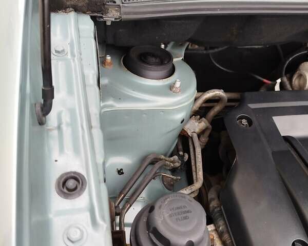 Синий Хендай Туксон, объемом двигателя 2 л и пробегом 213 тыс. км за 8900 $, фото 89 на Automoto.ua