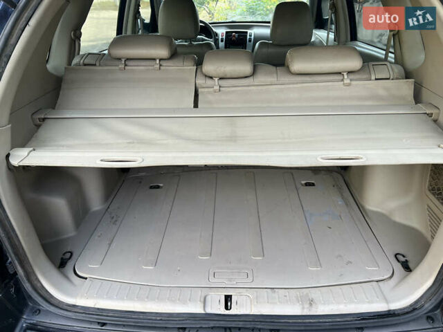 Синий Хендай Туксон, объемом двигателя 1.98 л и пробегом 210 тыс. км за 4500 $, фото 14 на Automoto.ua