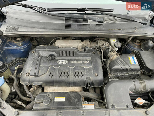 Синий Хендай Туксон, объемом двигателя 1.98 л и пробегом 163 тыс. км за 8000 $, фото 25 на Automoto.ua