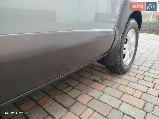 Синий Хендай Туксон, объемом двигателя 2 л и пробегом 213 тыс. км за 8900 $, фото 33 на Automoto.ua