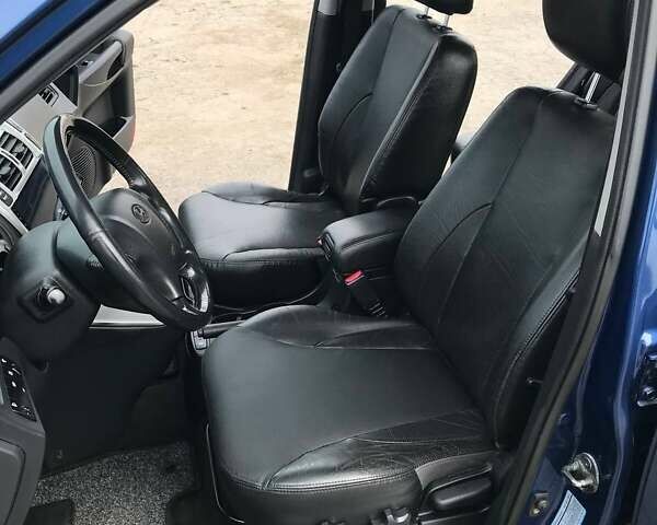 Синий Хендай Туксон, объемом двигателя 2 л и пробегом 178 тыс. км за 8500 $, фото 22 на Automoto.ua