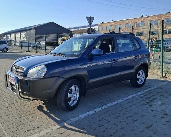 Синій Хендай Туксон, об'ємом двигуна 2 л та пробігом 158 тис. км за 8500 $, фото 6 на Automoto.ua