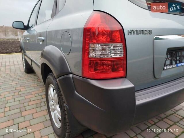 Синий Хендай Туксон, объемом двигателя 2 л и пробегом 213 тыс. км за 8900 $, фото 24 на Automoto.ua