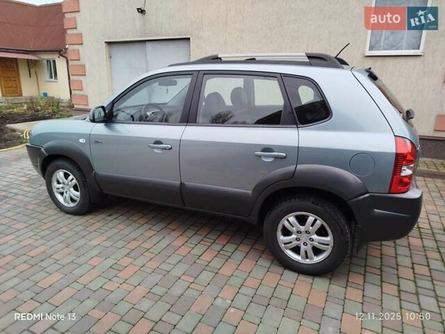Синий Хендай Туксон, объемом двигателя 2 л и пробегом 213 тыс. км за 8900 $, фото 16 на Automoto.ua