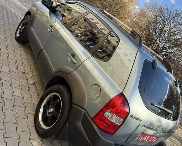 Синій Хендай Туксон, об'ємом двигуна 2 л та пробігом 203 тис. км за 7800 $, фото 4 на Automoto.ua