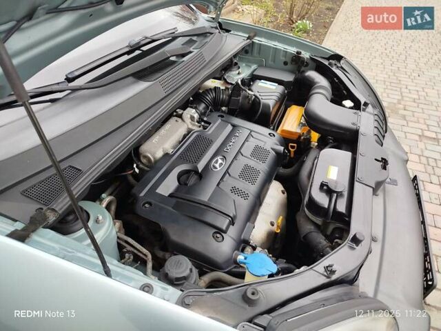 Синий Хендай Туксон, объемом двигателя 2 л и пробегом 213 тыс. км за 8900 $, фото 81 на Automoto.ua