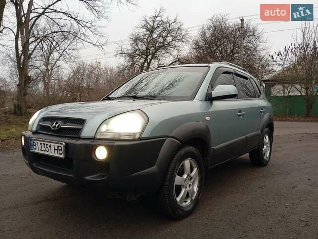 Синій Хендай Туксон, об'ємом двигуна 1.98 л та пробігом 269 тис. км за 7300 $, фото 2 на Automoto.ua