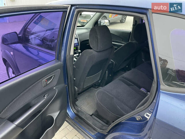 Синий Хендай Туксон, объемом двигателя 1.98 л и пробегом 163 тыс. км за 8000 $, фото 11 на Automoto.ua