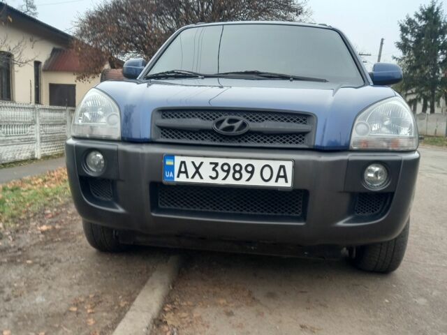 Синий Хендай Туксон, объемом двигателя 2 л и пробегом 170 тыс. км за 8500 $, фото 1 на Automoto.ua