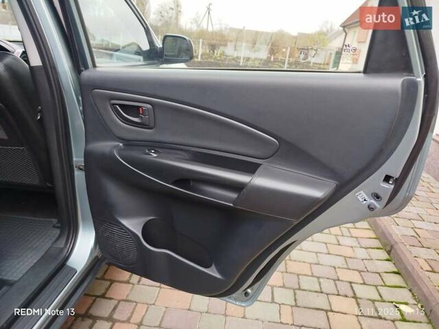 Синий Хендай Туксон, объемом двигателя 2 л и пробегом 213 тыс. км за 8900 $, фото 61 на Automoto.ua