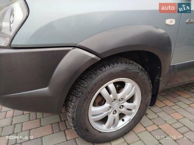 Синий Хендай Туксон, объемом двигателя 2 л и пробегом 213 тыс. км за 8900 $, фото 19 на Automoto.ua