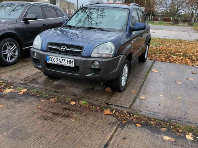Синий Хендай Туксон, объемом двигателя 2 л и пробегом 156 тыс. км за 6850 $, фото 6 на Automoto.ua