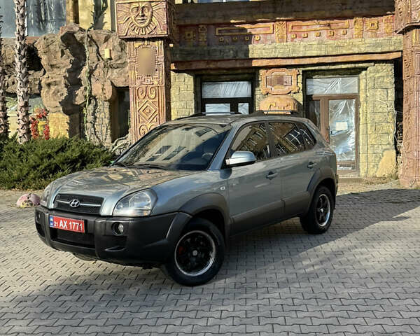 Синий Хендай Туксон, объемом двигателя 2 л и пробегом 205 тыс. км за 7500 $, фото 10 на Automoto.ua