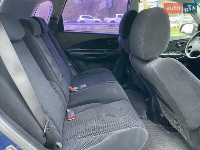 Синий Хендай Туксон, объемом двигателя 1.98 л и пробегом 163 тыс. км за 8000 $, фото 16 на Automoto.ua