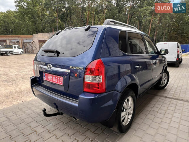 Синий Хендай Туксон, объемом двигателя 2 л и пробегом 218 тыс. км за 6700 $, фото 4 на Automoto.ua